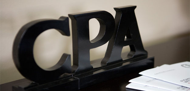 Black Letters 'CPA' on office desk